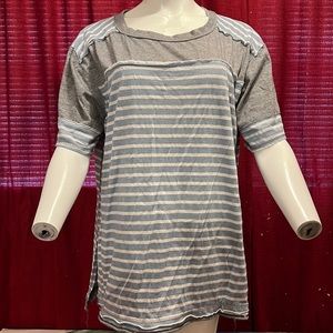 UMGEE USA exposed seams blue stripe short sleeve top.